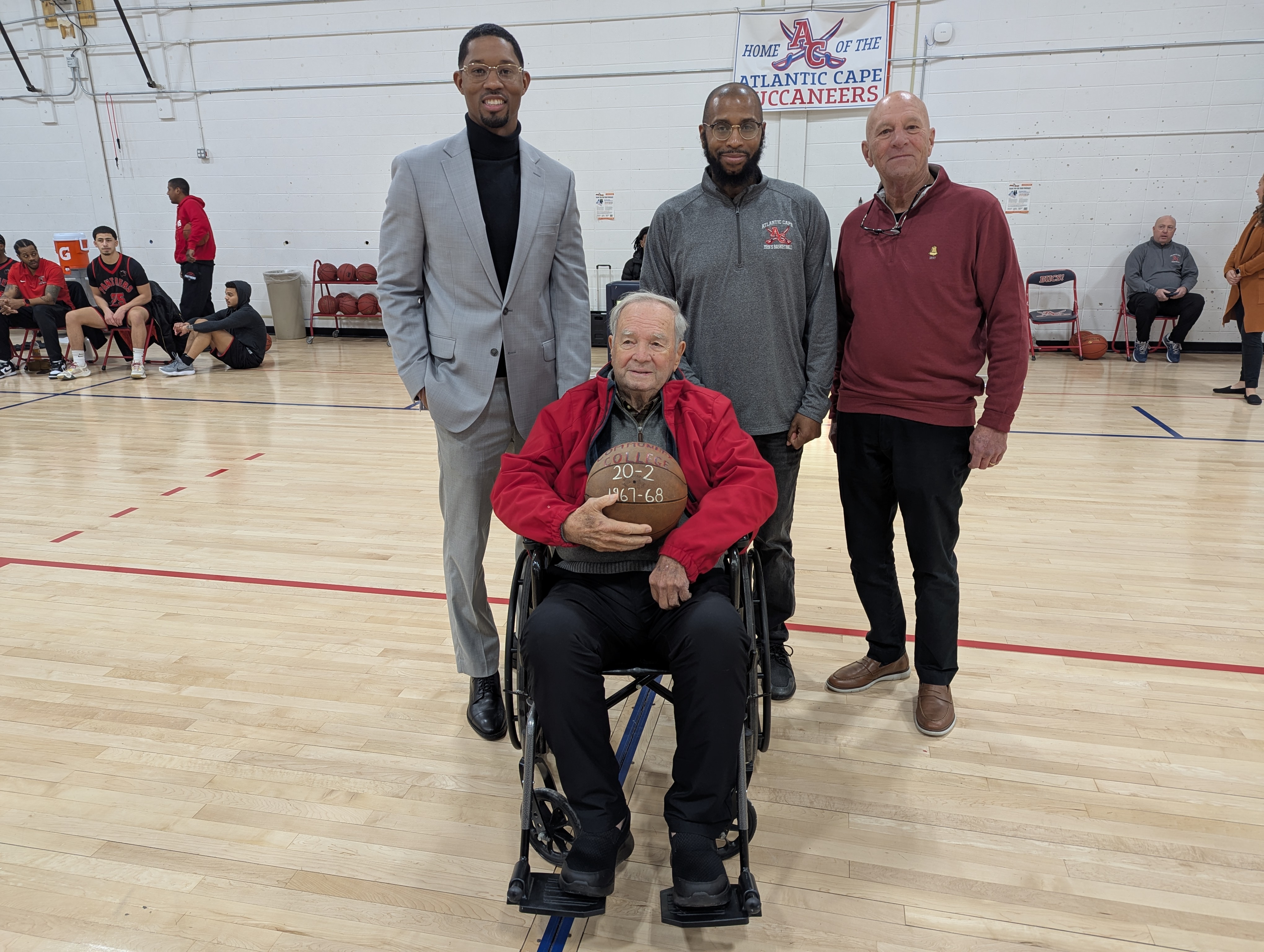 Robert Goudie with former student athlete John Huff and Atlantic Cape's Jamal Edwards and Allen Ragland